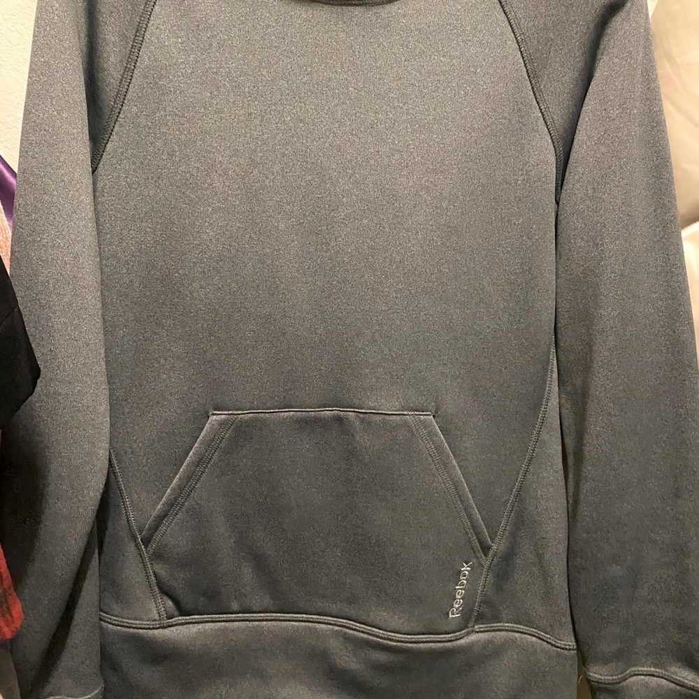 Warm and soft Reebok hooded sweater.